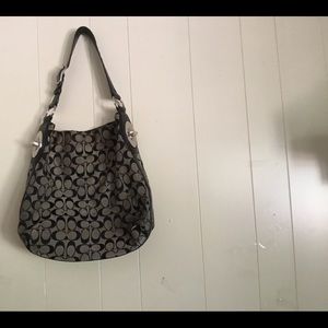 Coach purse medium size, Black and grey very nice purse. Signature purse.